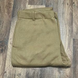 Never worn sweat pants. They are thicker, have a zipper, snap, and belt loops.